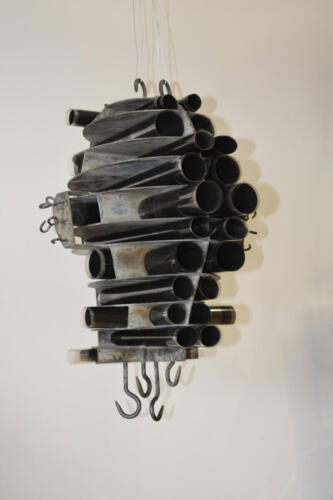 NewsFeed, black metal, plastic, 2022
